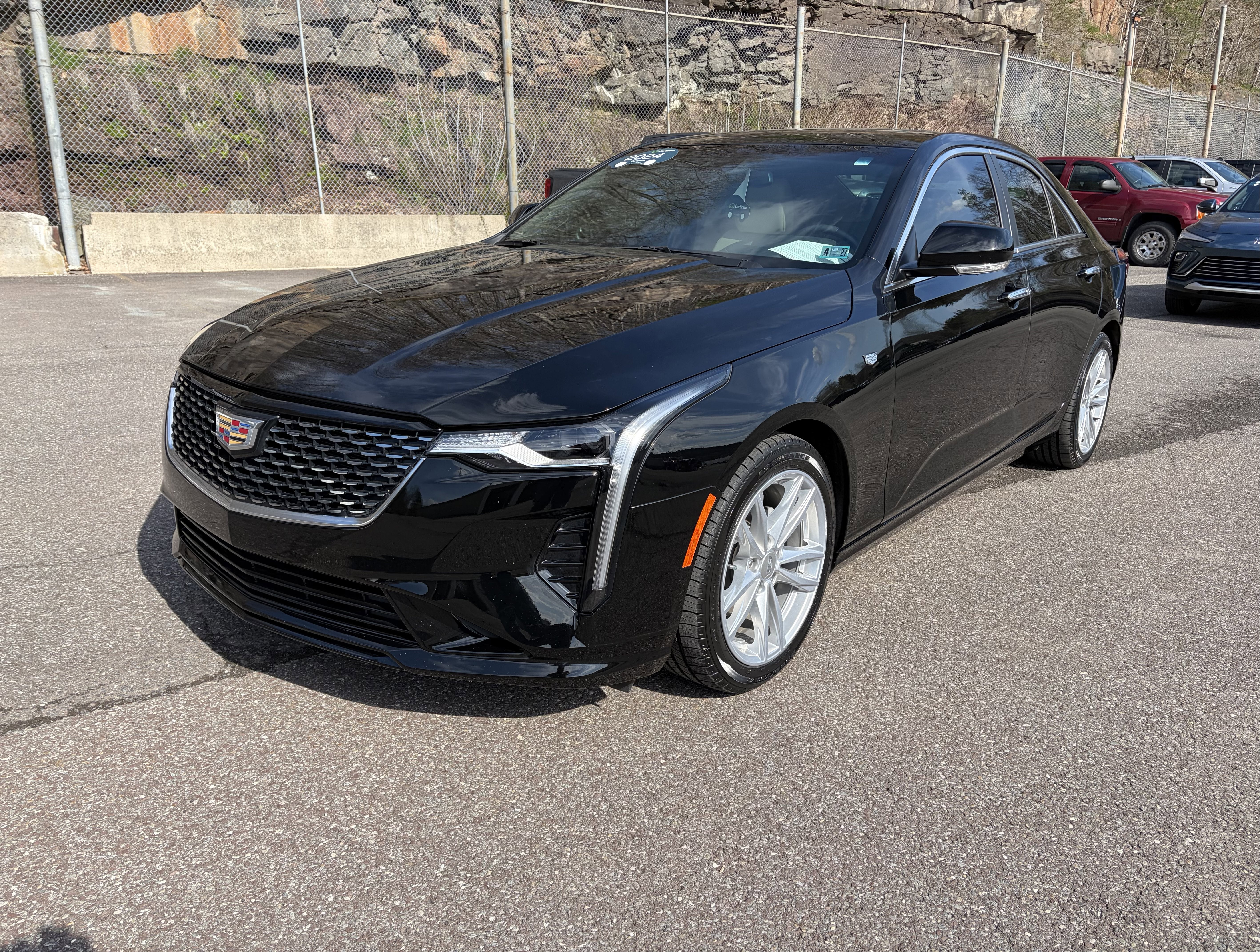 2024 Cadillac CT4 Luxury in Black Raven — front three-quarter view