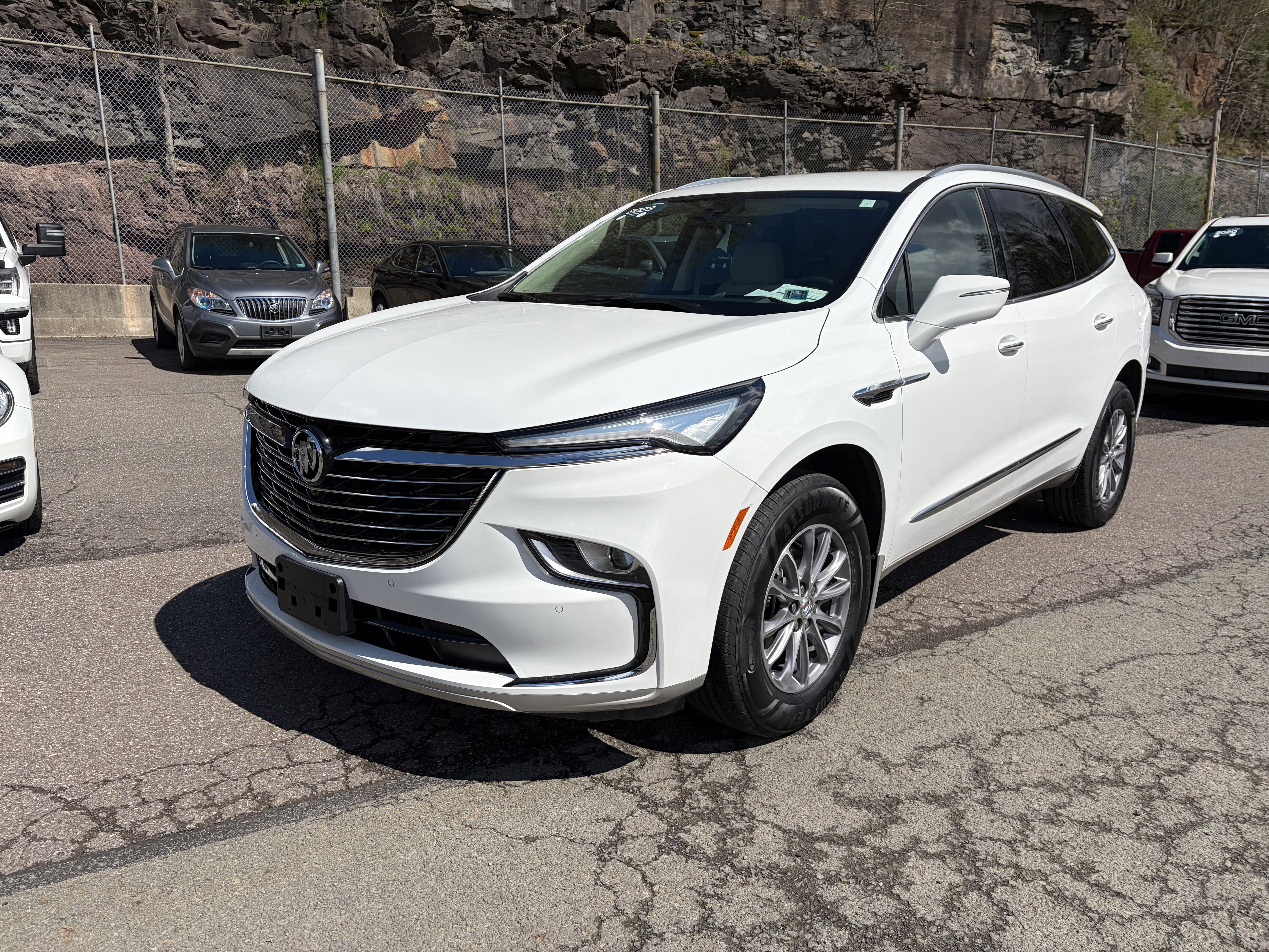 2023 Buick Enclave Premium in Summit White — front three-quarter view
