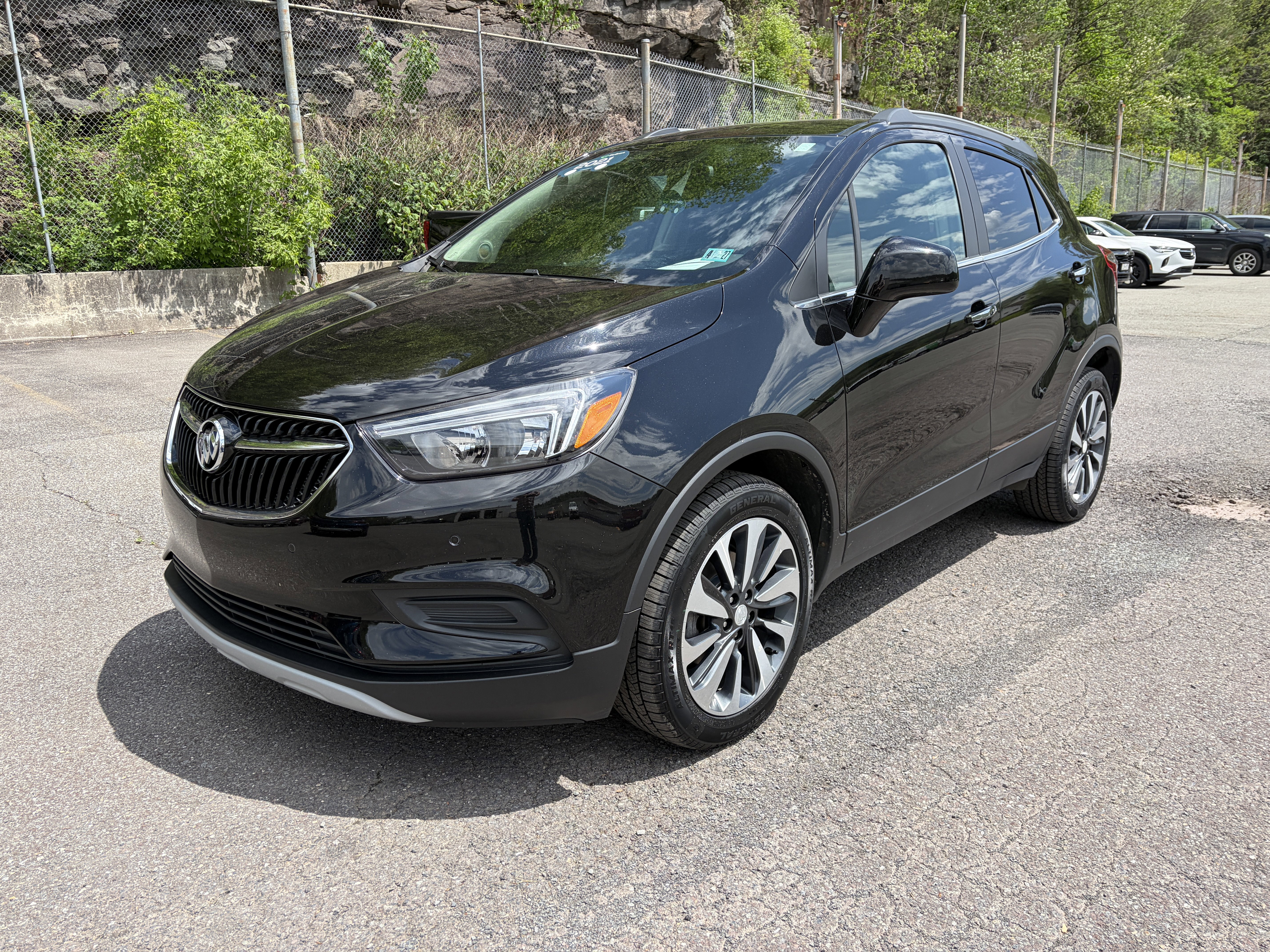 2021 Buick Encore Preferred in Includes (Mdp) Anthracite Lower Exterior Accent Color, Paint Code W598f. — front three-quarter view