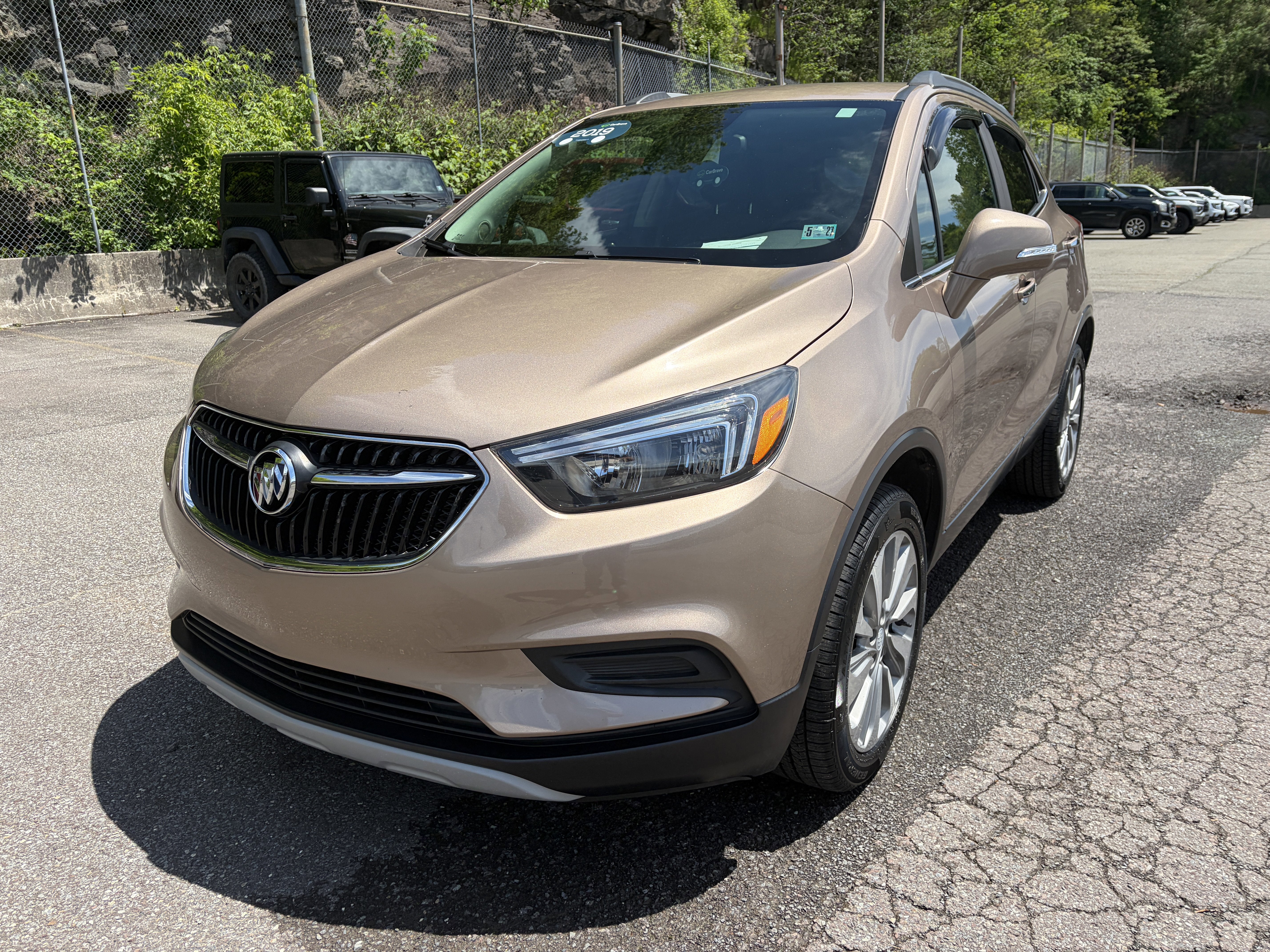 2019 Buick Encore Preferred in Includes (Cm5) Black Carbon Metallic Lower Exterior Accent Color, Paint Code W700s. — front three-quarter...